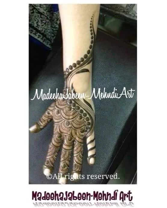 Butterfly Inspired Vibrant Back Hand Mehndi Design